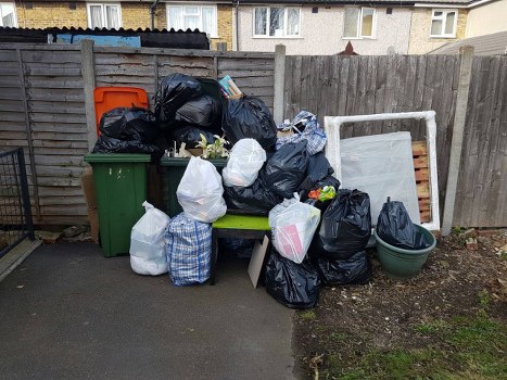 Enclosed and lockable skip placed in a residential area of Mottingham